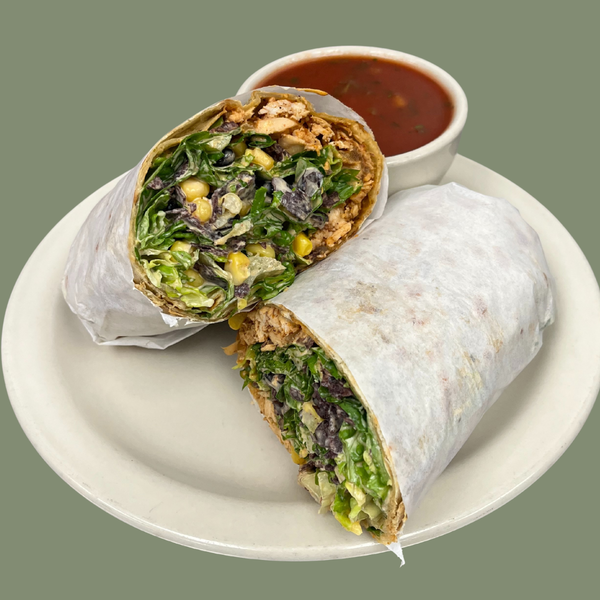 Southwest Caesar Wrap with chicken, lettuce, corn, wrapped in a garlic herb tortilla, served with a cup of gazpacho